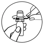 A close-up of a hand holding a small bottle
Description automatically generated
