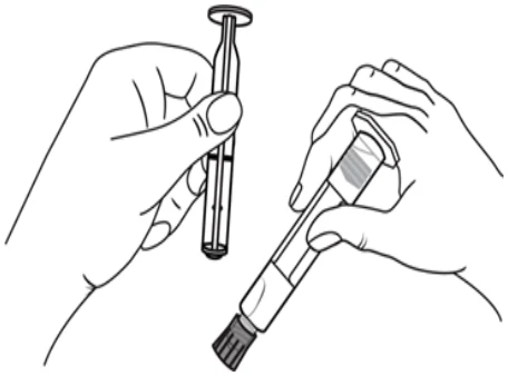 A close-up of a hand holding a syringe
Description automatically generated